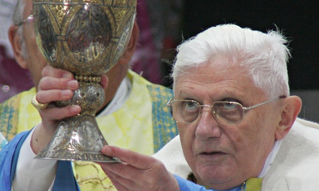 Pope Benedict XVI lifts the wine bowl